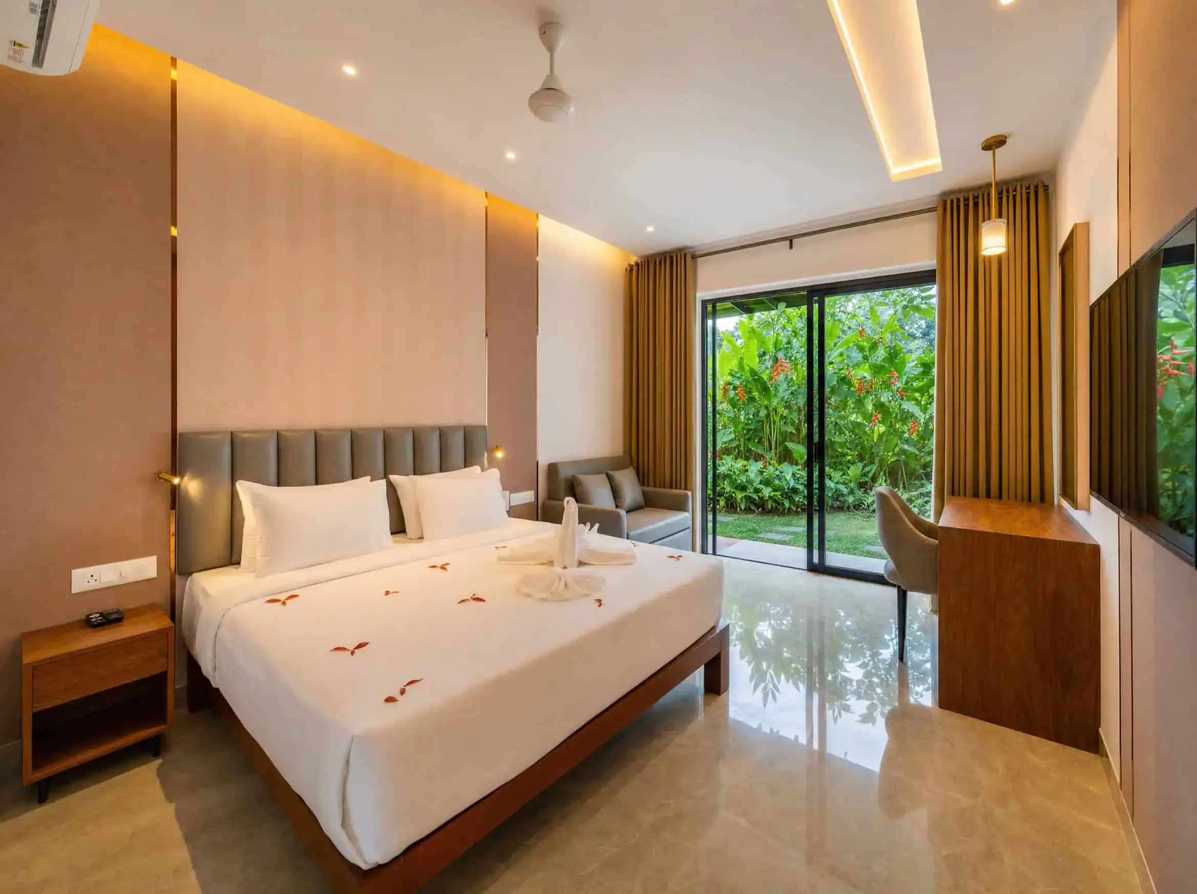 Vega Delight Cottage with king bed, warm interiors and private garden patio access at Vega Munnar